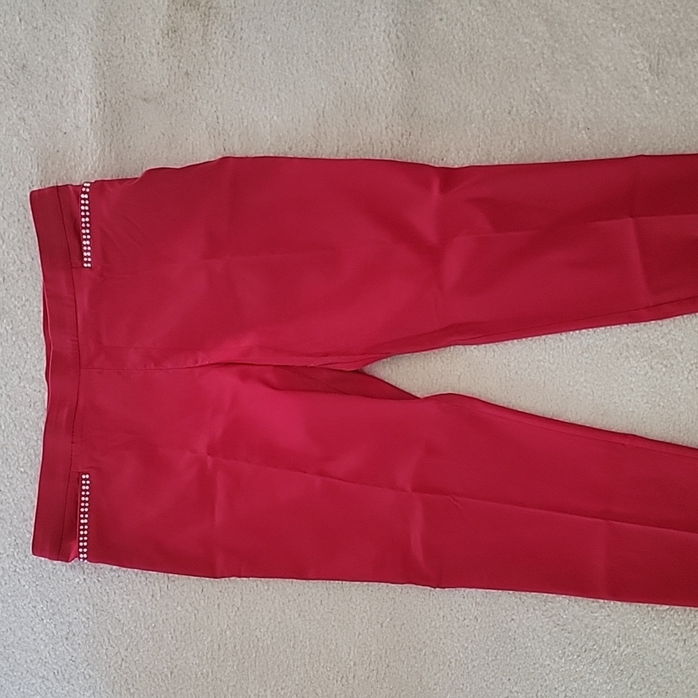 No tags, but never worn red stretch slacks.